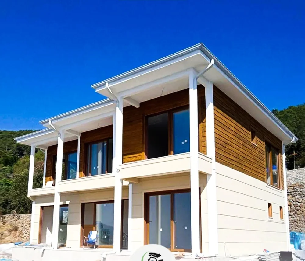 Çift katlı ahşap dokulu prefabrik villa uygulaması